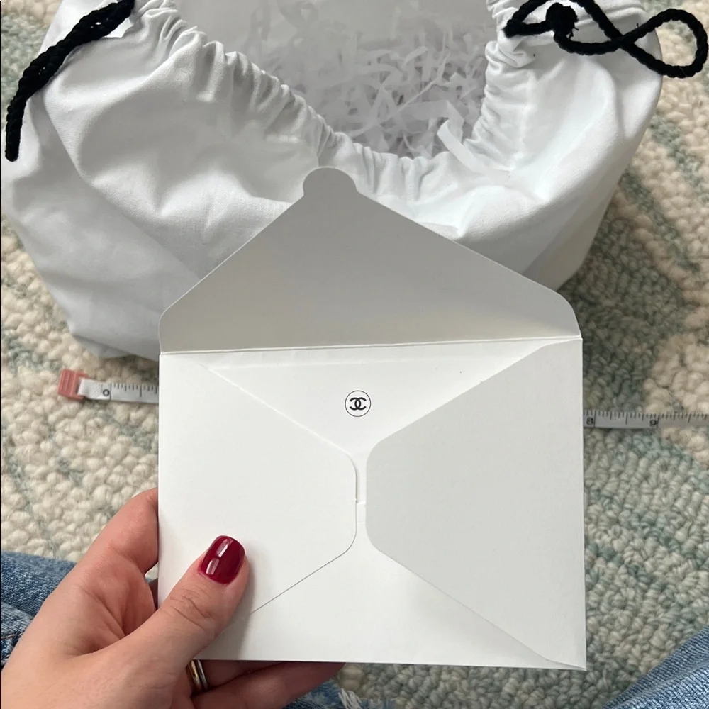 CHANEL White Pouch with Black Logo